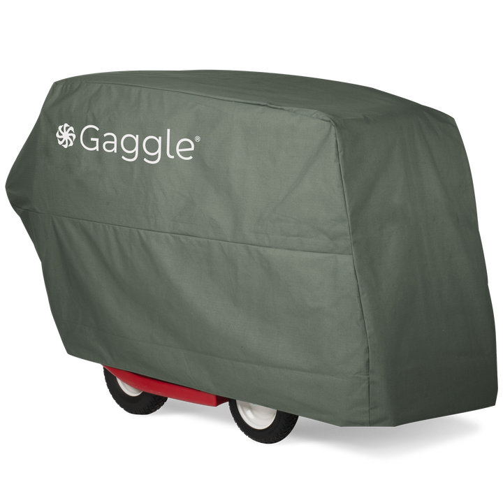 Green Gaggle branded cover on a red 6 seat buggy
