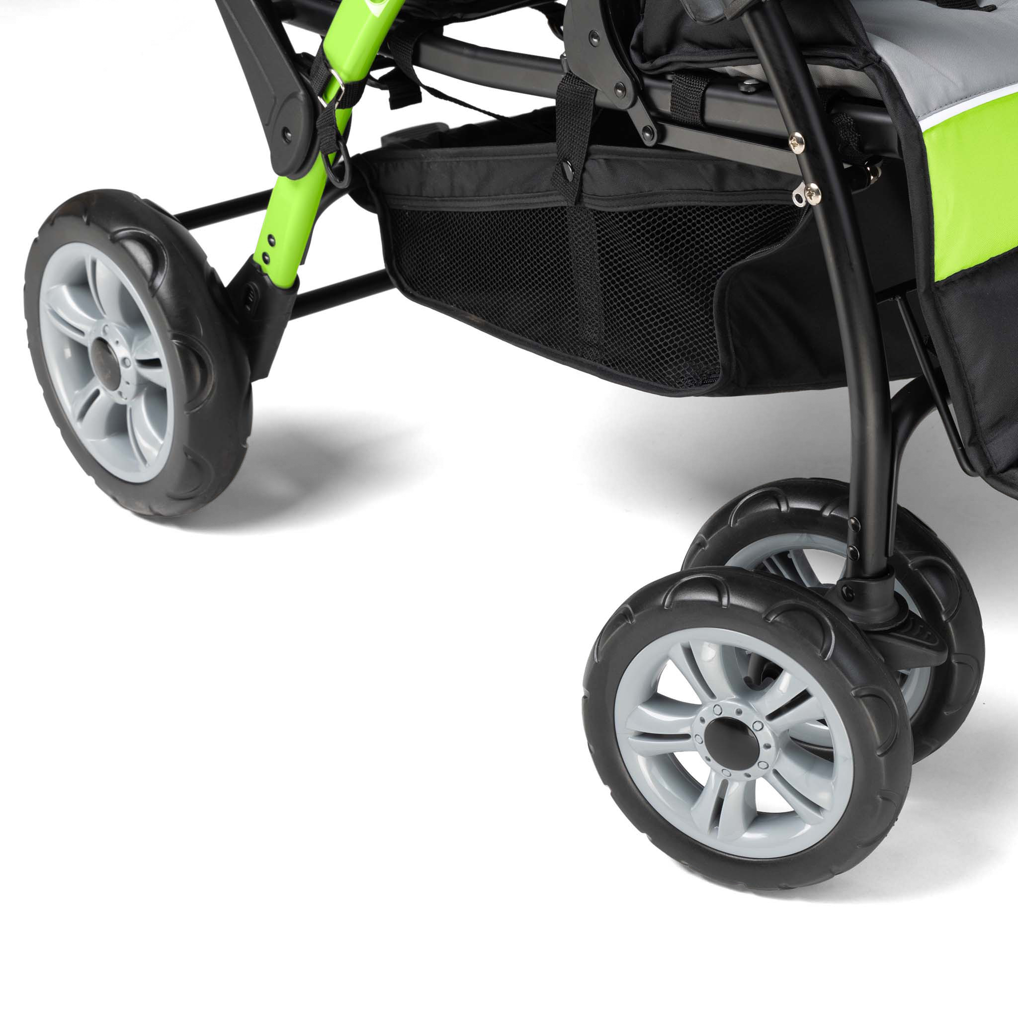 Close-up of a stroller wheels with green accents