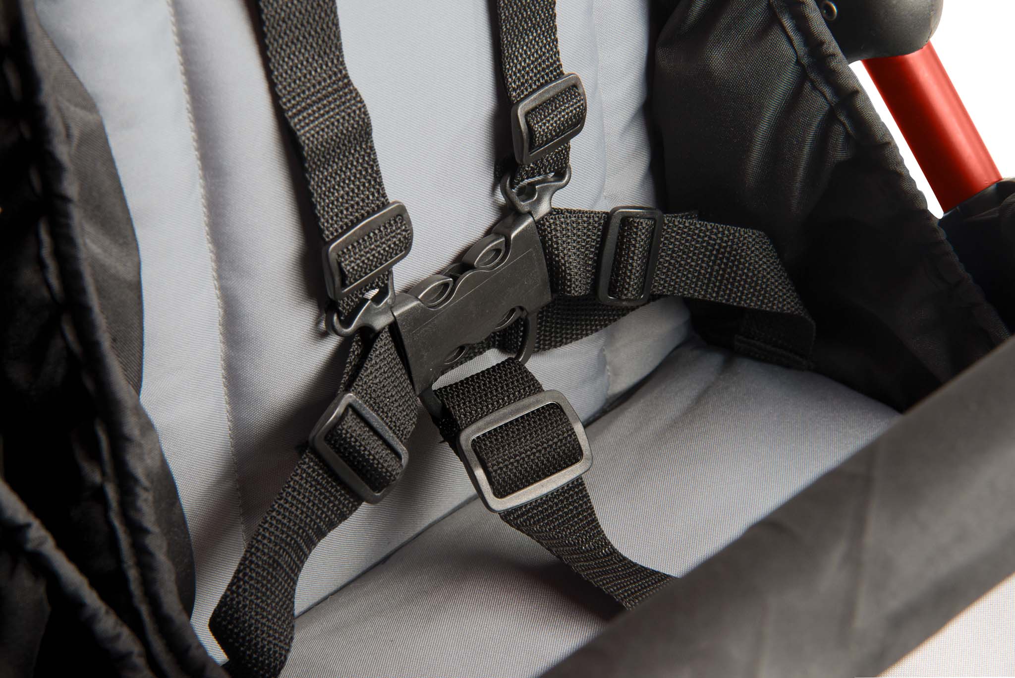 Close-up of a child safety seat harness of a stroller