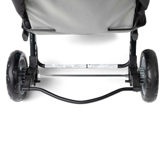 Close-up of a stroller's wheels and brake system 