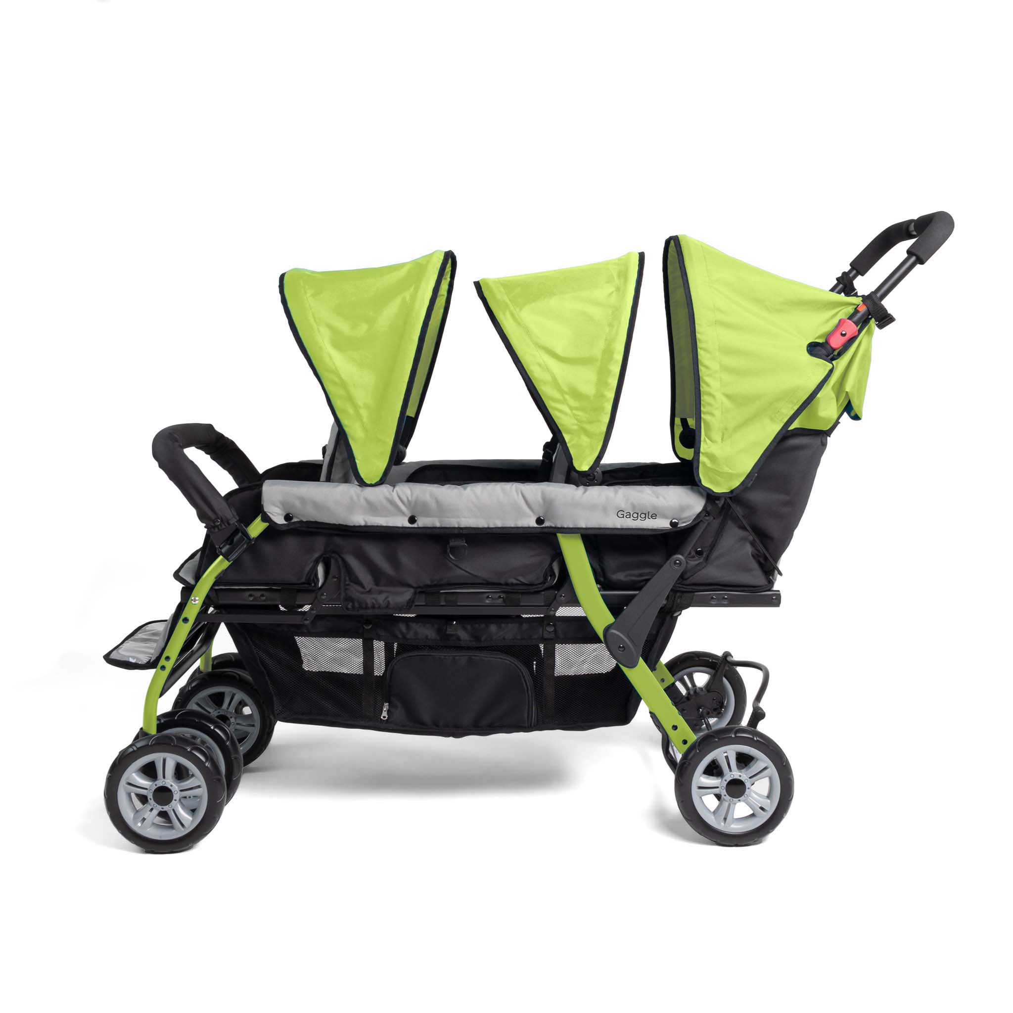 Side of triple stroller with green canopies 