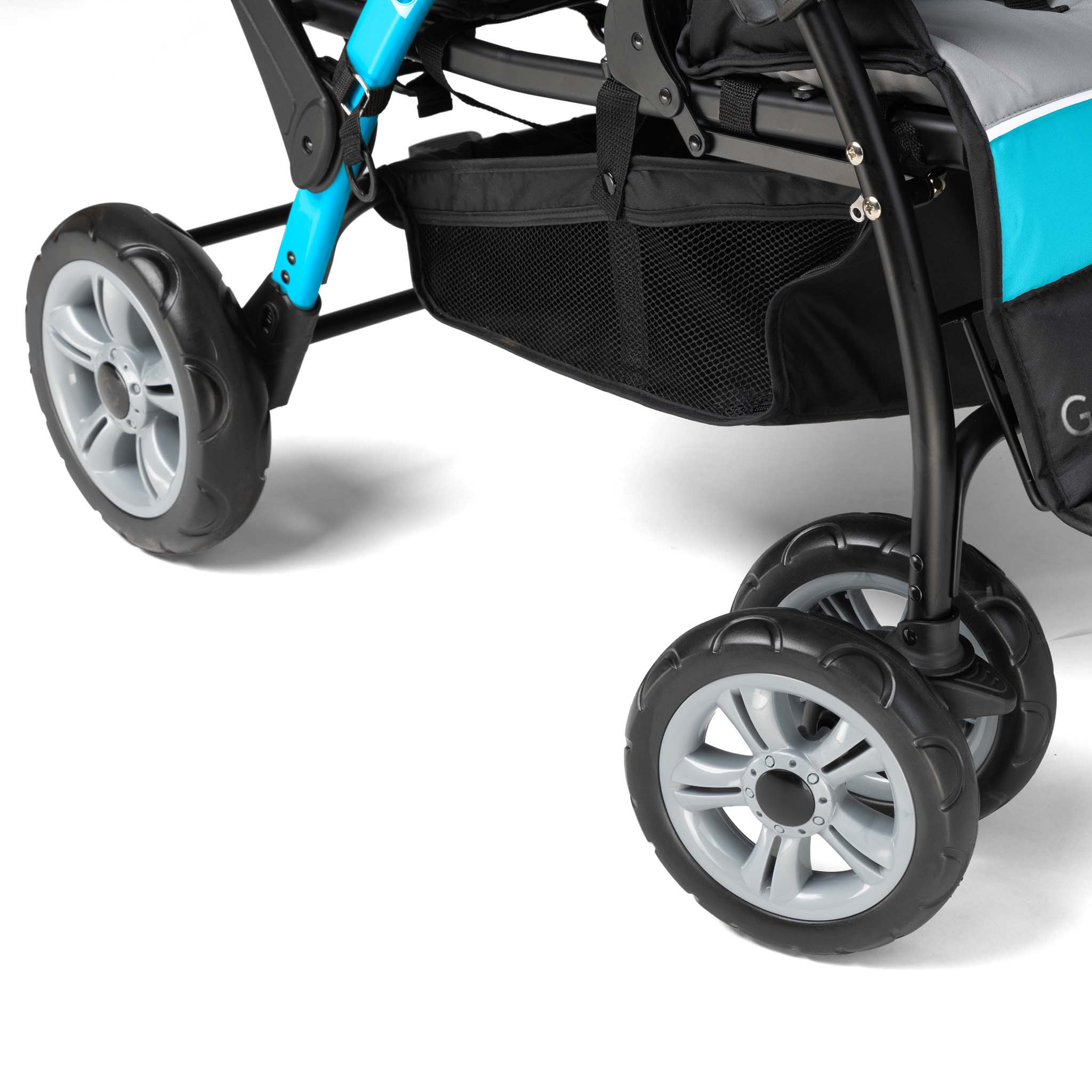 Close-up of a stroller with black wheels 