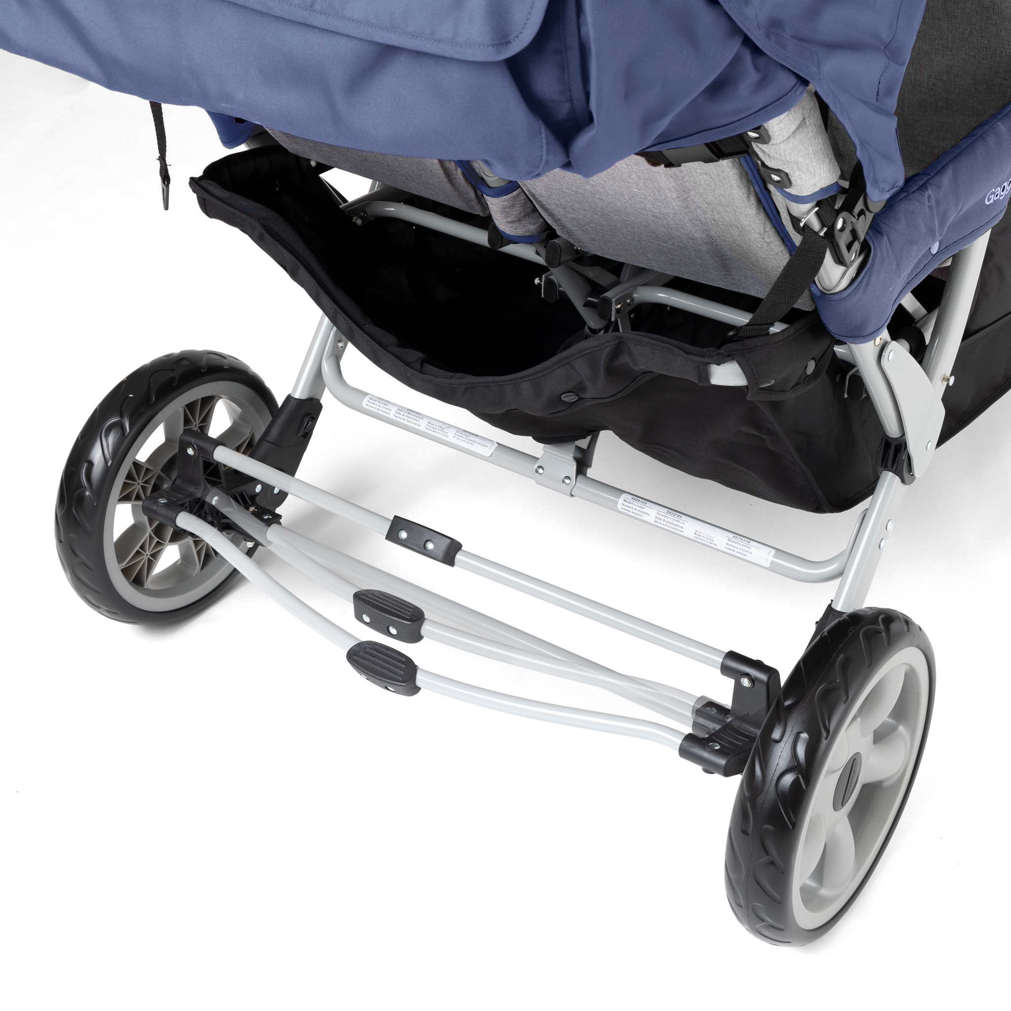 Close-up of a stroller foot operated brake system