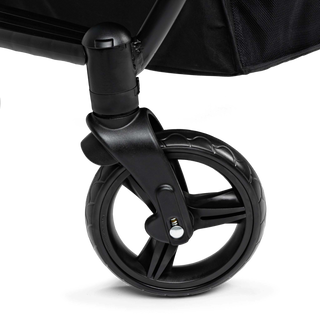 Close-up of a black stroller wheel 