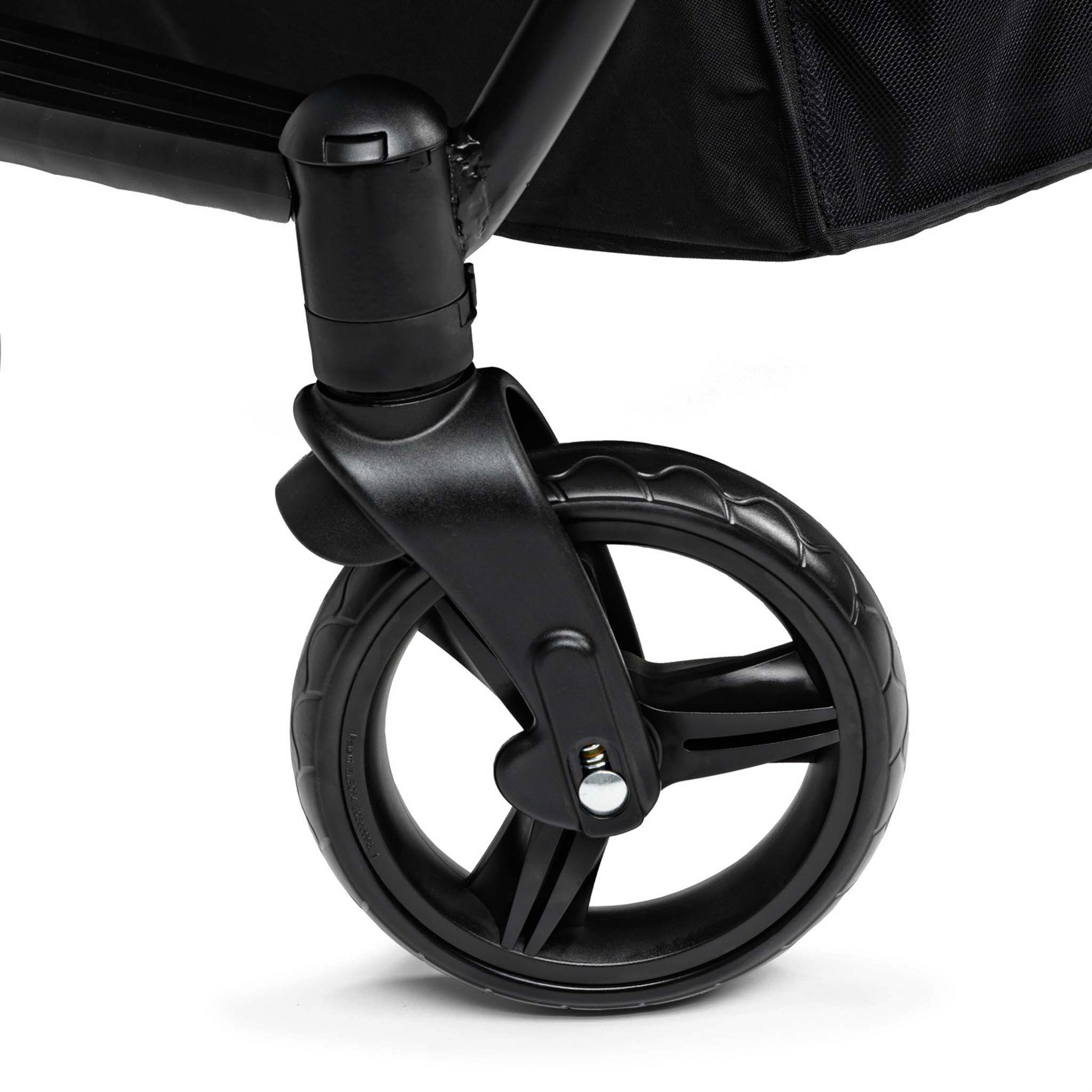 Close-up of a black stroller wheel 