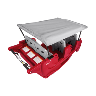 Top of red and gray childrens vehicle with a gray canopy roof