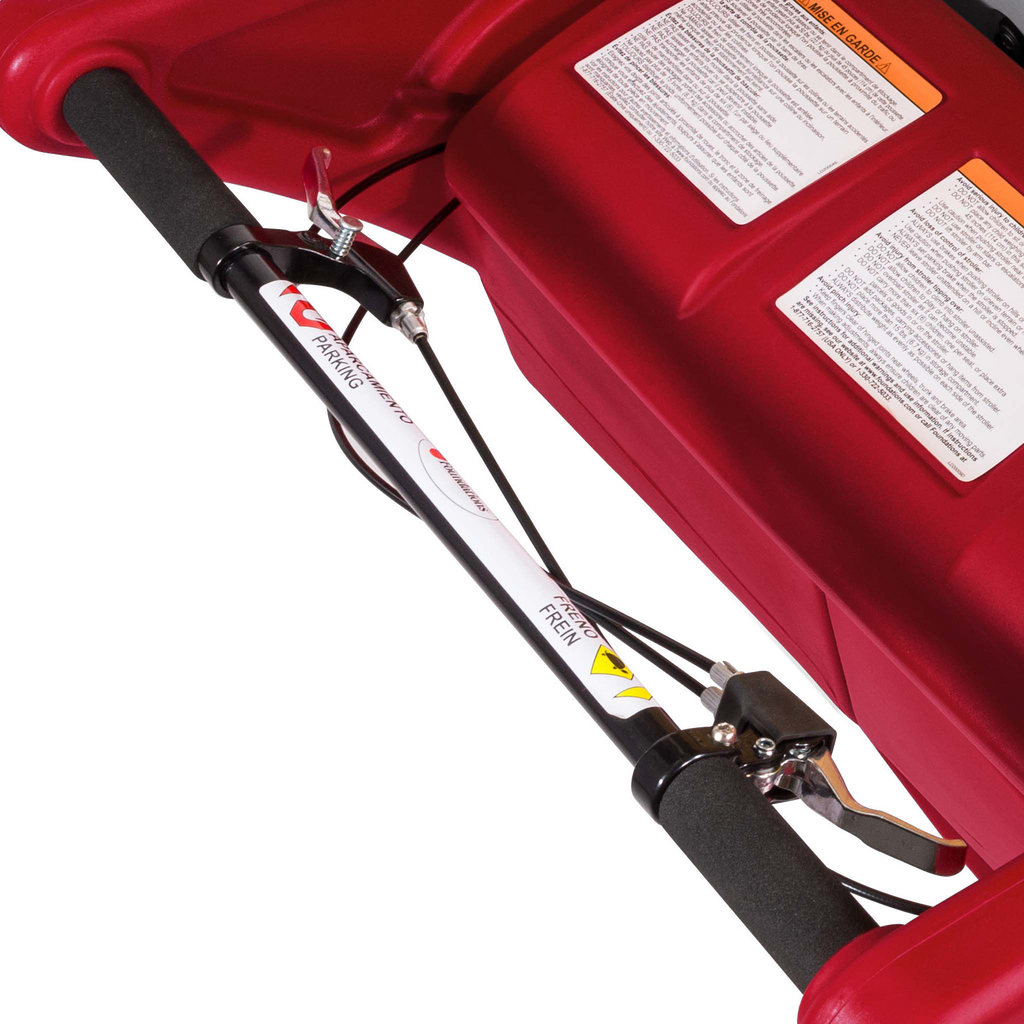 Close-up of a red 6 seat buggy handlebars and brakes