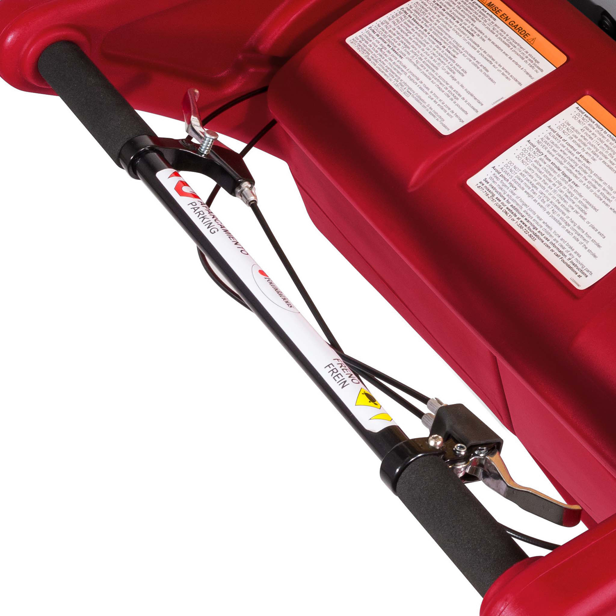 Close-up of a red 6 seat buggy handlebars and brakes