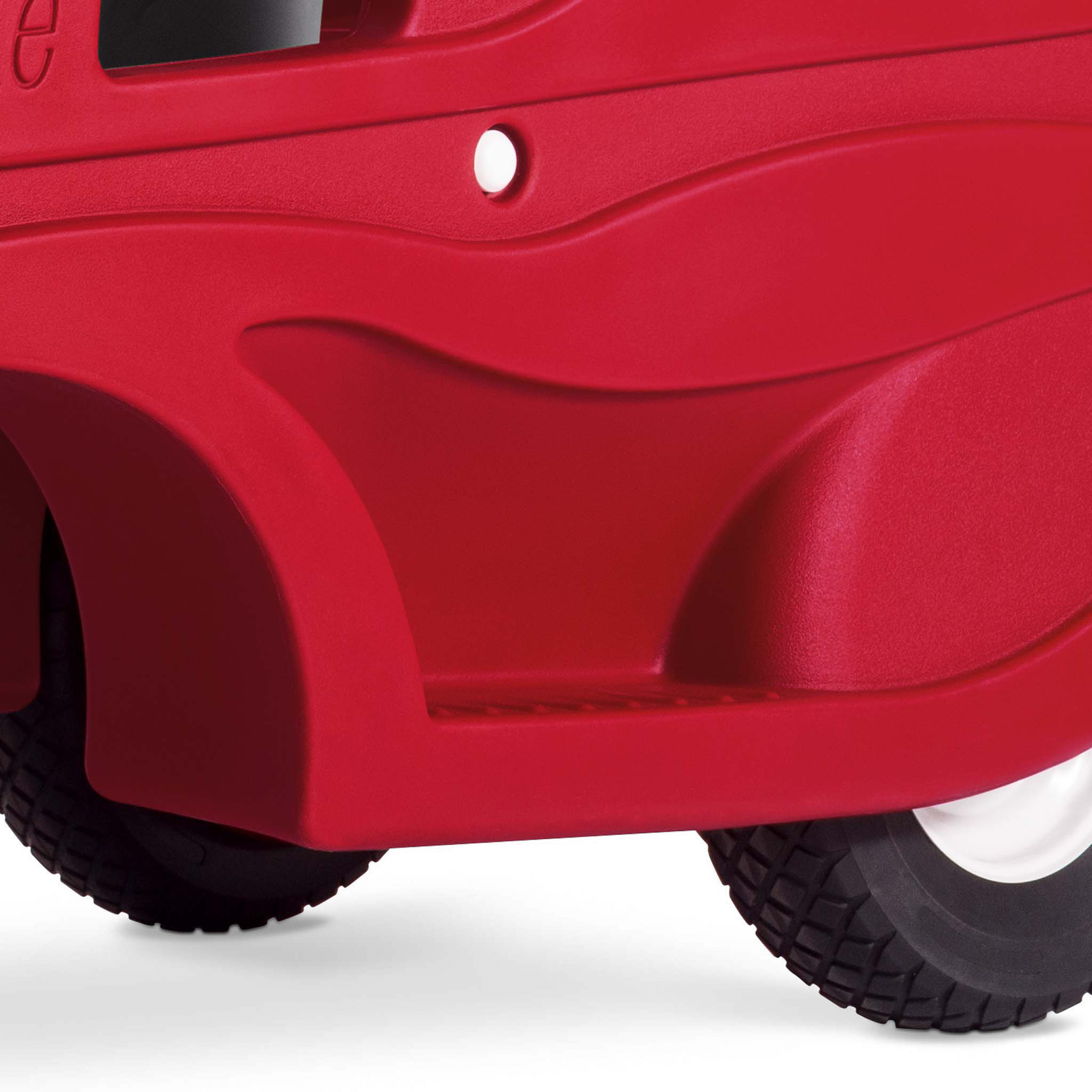Close-up of a red 6 seat buggy self loading step