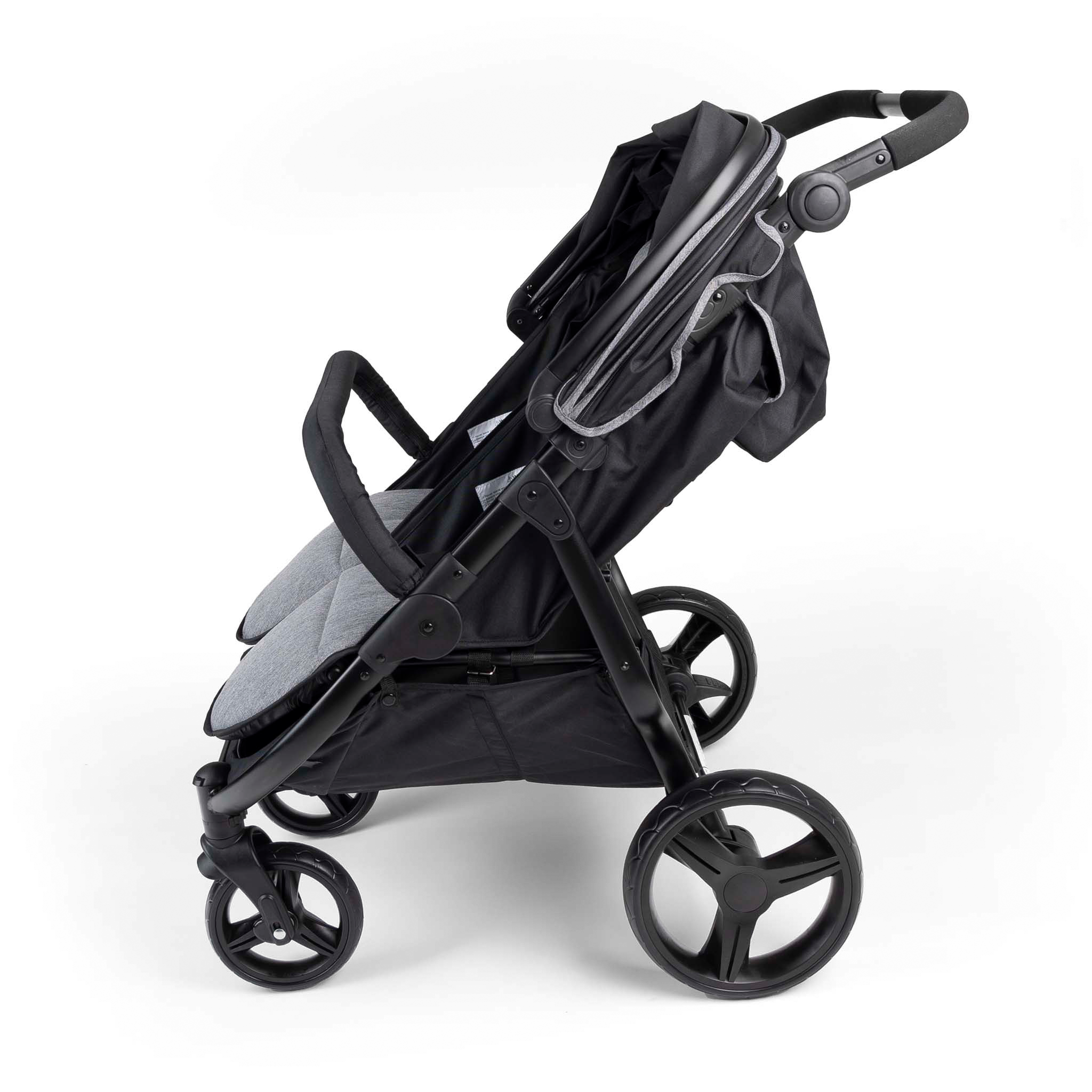Black double stroller side view with canopy up